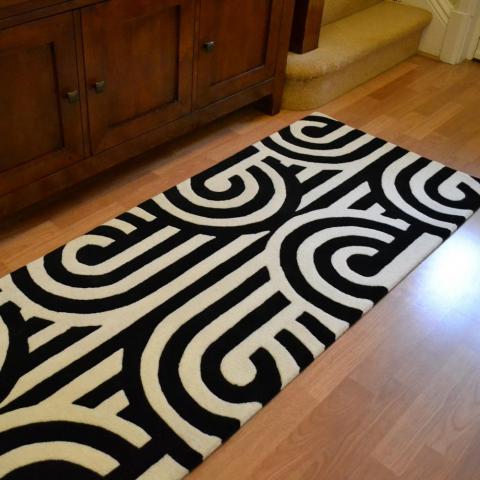 Turnabouts Retro Runner Rugs in 39205 Black White by Florence Broadhurst